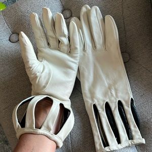 1940S BLACK LEATHER GLOVES WITH CUT OUTS FOR BALLOON WRIST PUFF STYLE